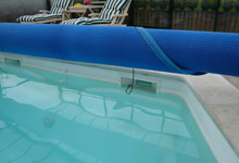 Enrouleur pour couverture solaire piscine